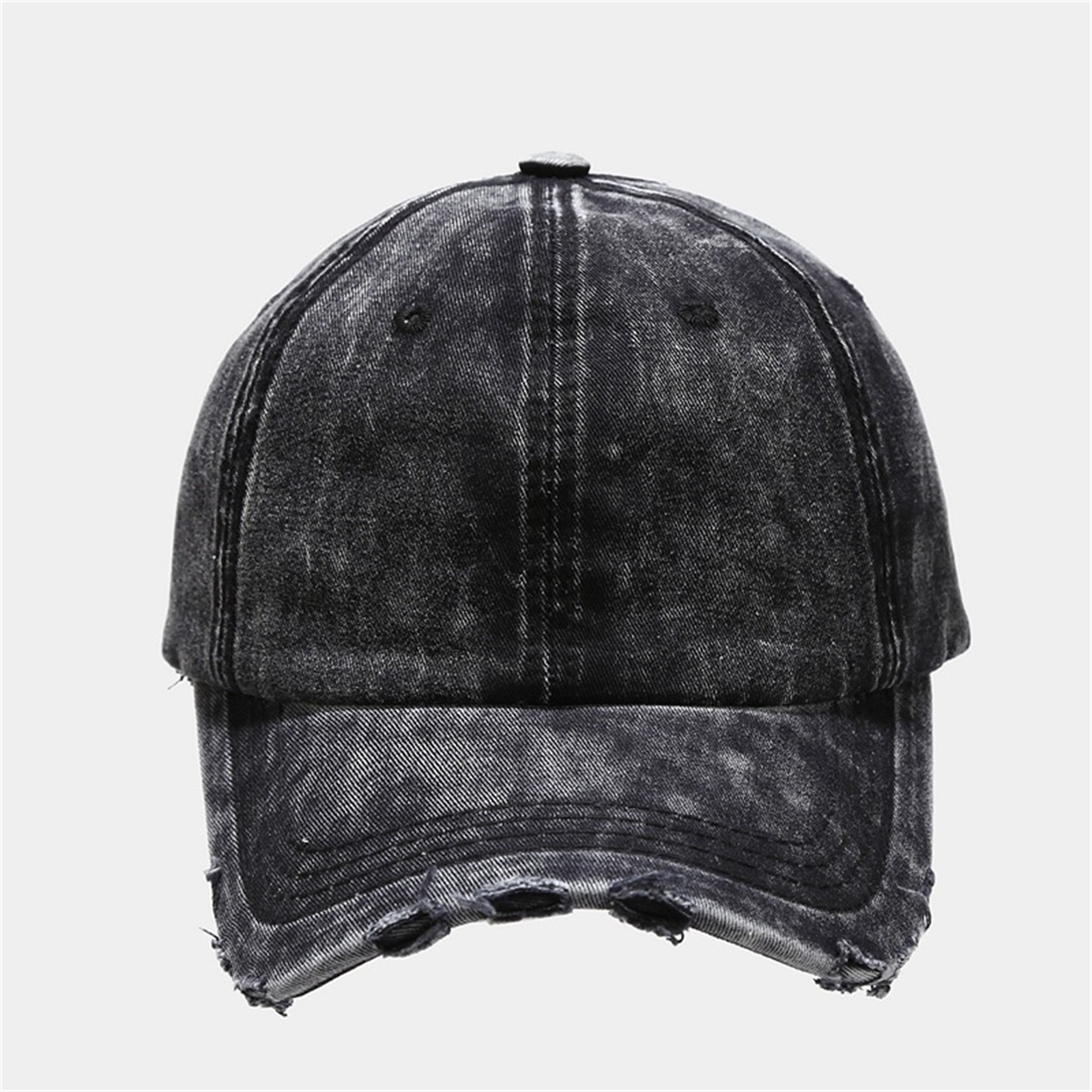 Washed and distressed denim baseball cap with holes and